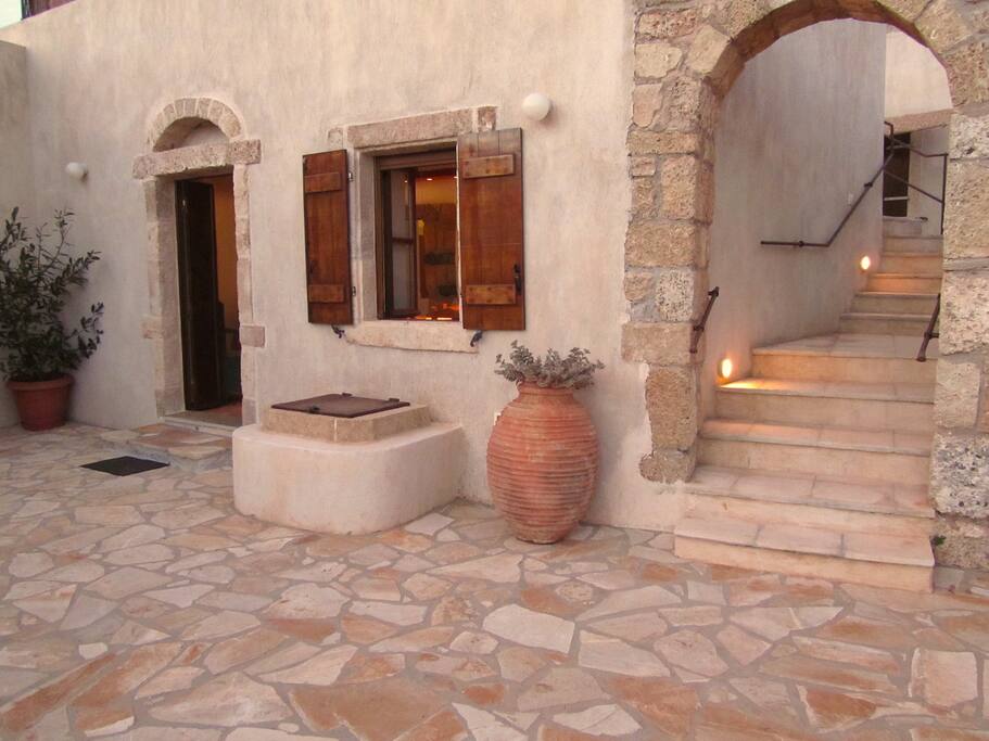 Courtyard connects to kitchen courtyard and roof deck steps