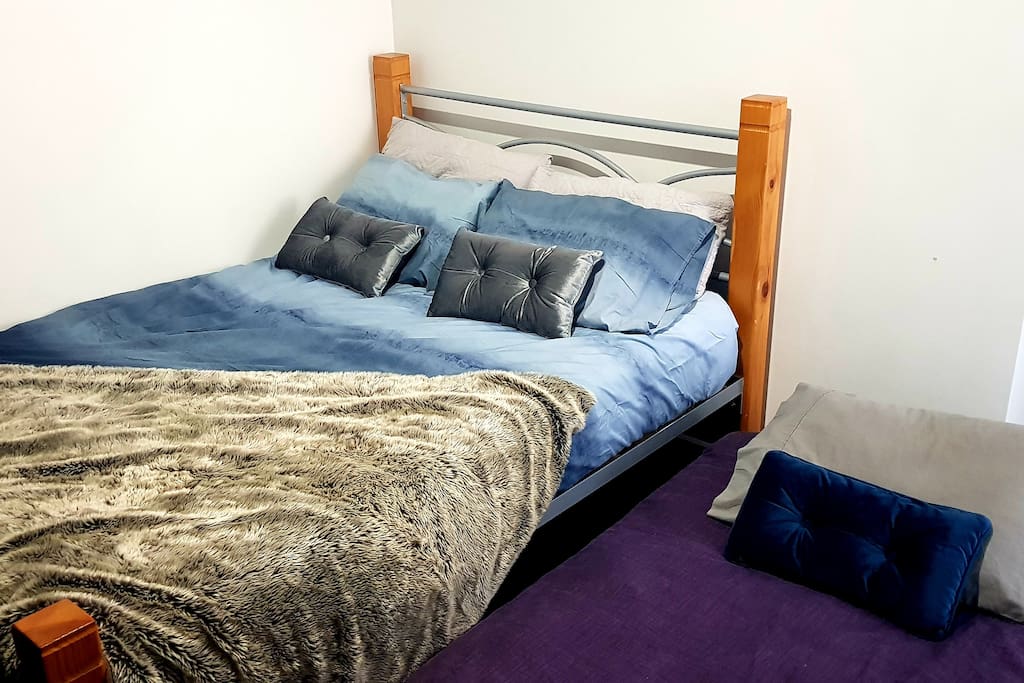 Double bed and option for single roll out bed