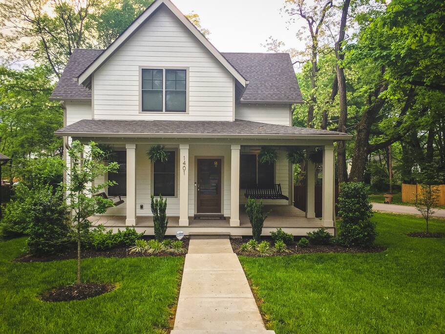 Wrap around porch with swing.
