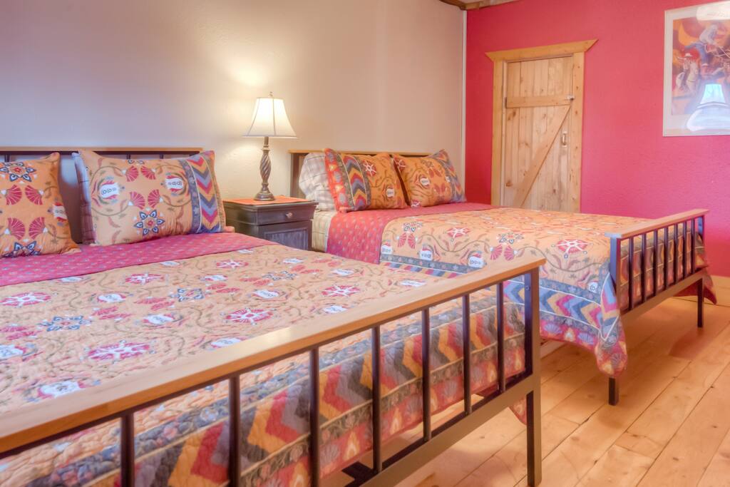Large bedroom with two queen beds