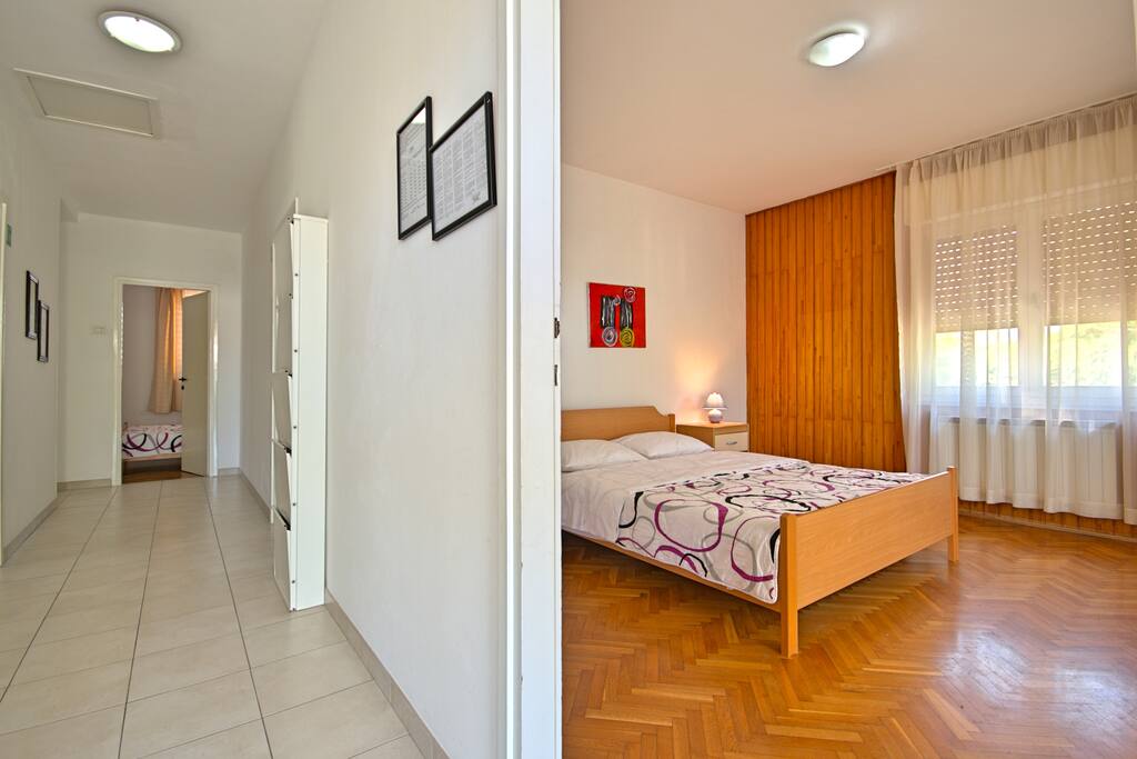 The hall and entrance to the bedroom 1