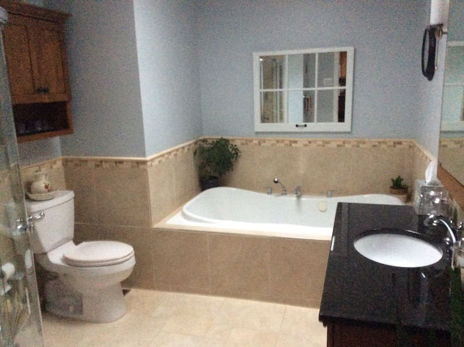 After a long day enjoy a leisurely soak in the Jet Tub or take a quick shower in the separate walk-in shower.