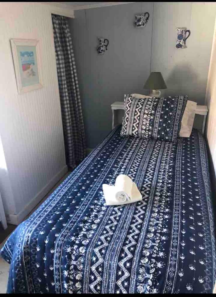 The hide away room has a single bed, it's a small quiet space perfect for one person to enjoy a relaxing nap or some much needed alone time.