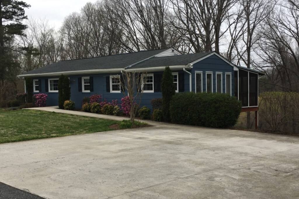 Front of house, four car driveway