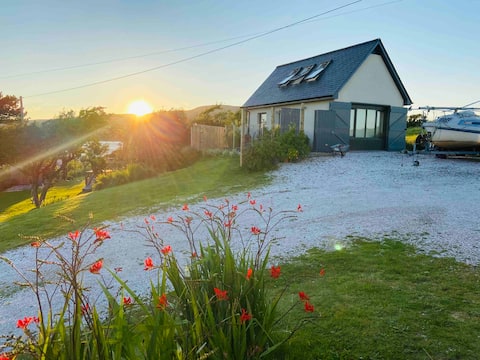 The Boathouse 
Luxury Coastal Escape For 2