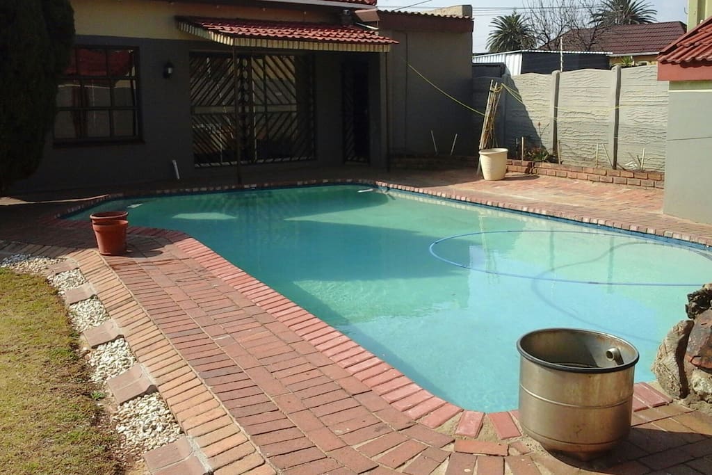 the swimming pool in the back section of the self catering unit of R and R self catering unit