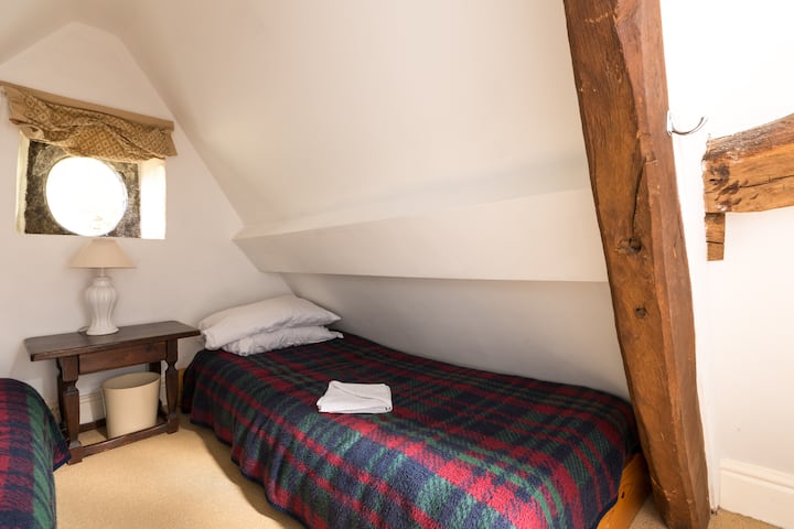 Twin beds under the eaves