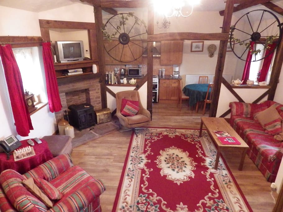 Your cosy lounge with original beams and added features