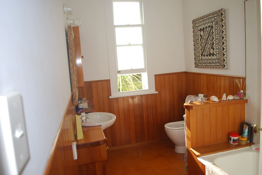 Private bathroom , spaceous with over bath shower.