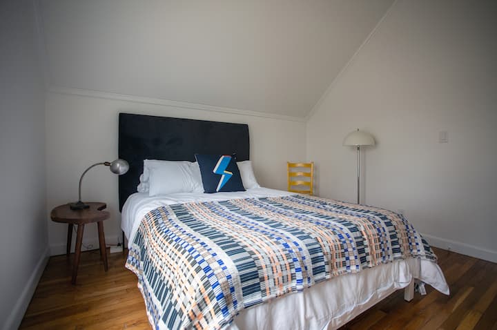 Guest bedroom # 3 with queen bed.
