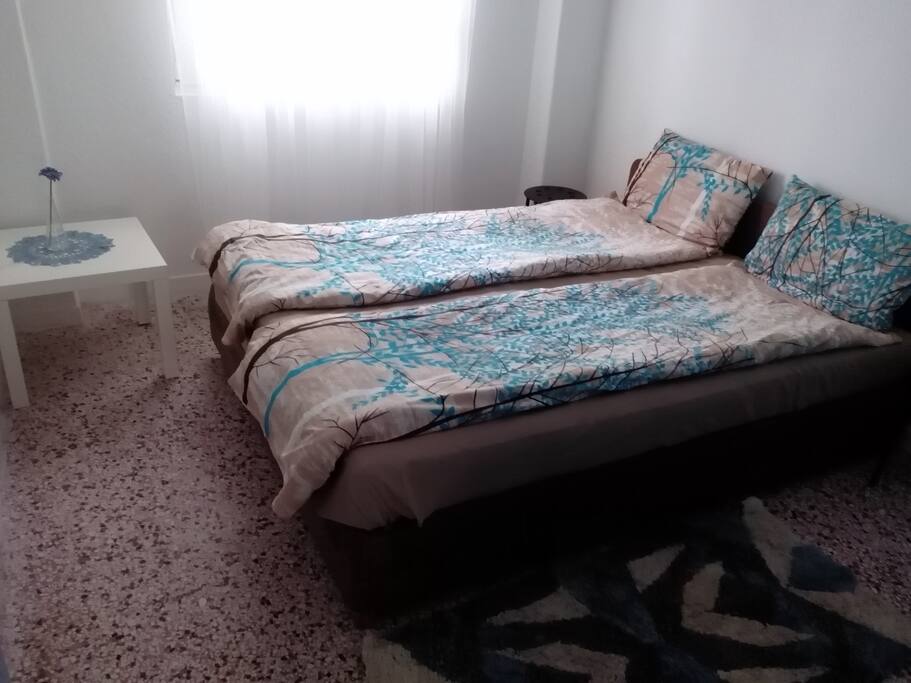 The bedroom with a queen sized bed