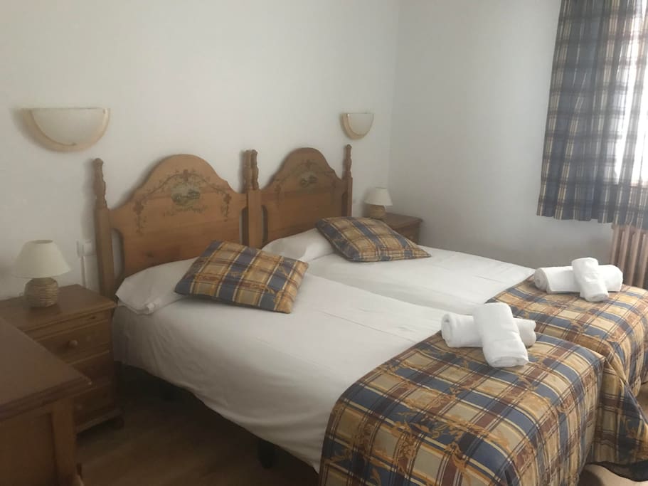 Bedroom 1 with 2 single beds