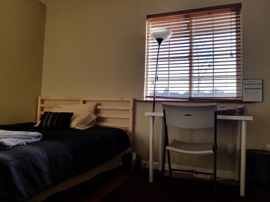 Queen bed with desk