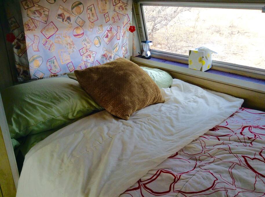 Comfy, cozy sleeping area in our "adorkable" camper