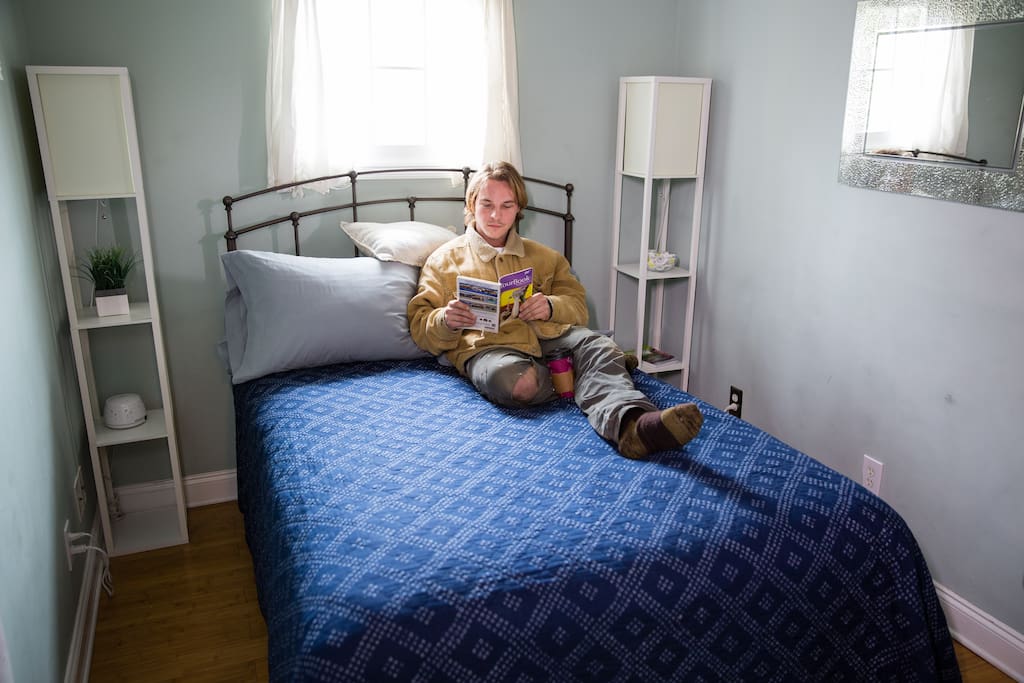 The Hemingway Room has a double bed and a closet for luggage storage. It's a small but sweet room.
