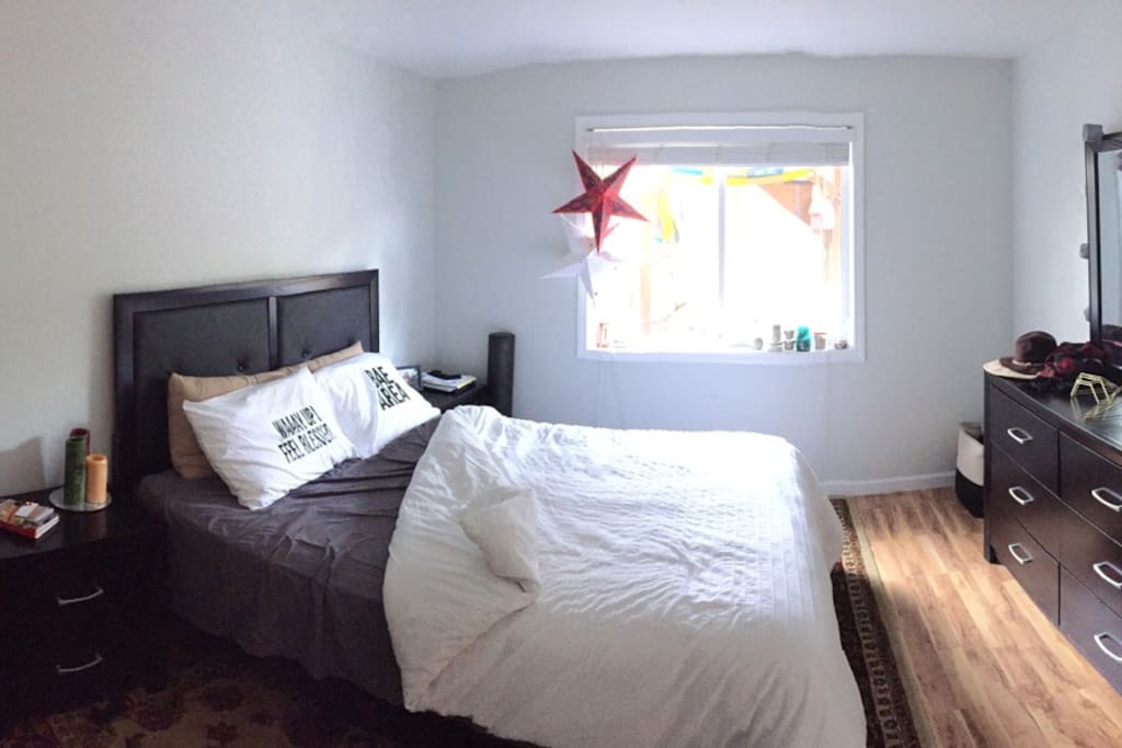 Comfortable queen size bed & large bedroom window
