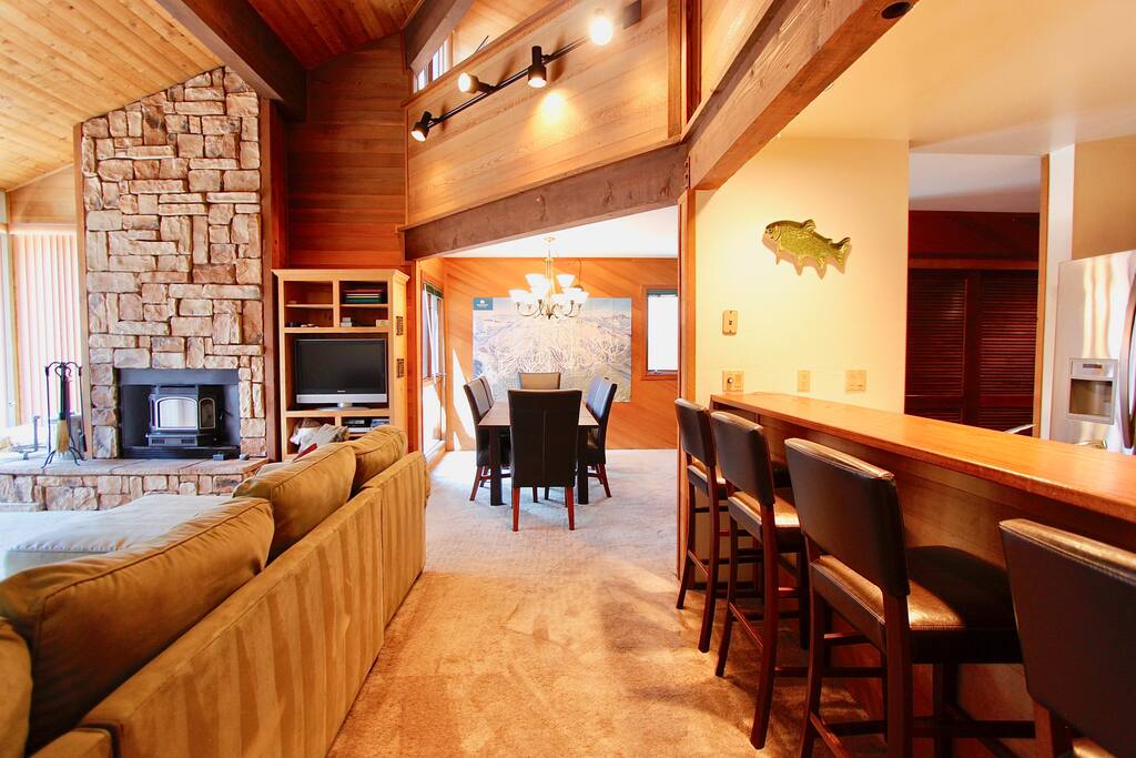 Large dining area and bar seating at the kitchen