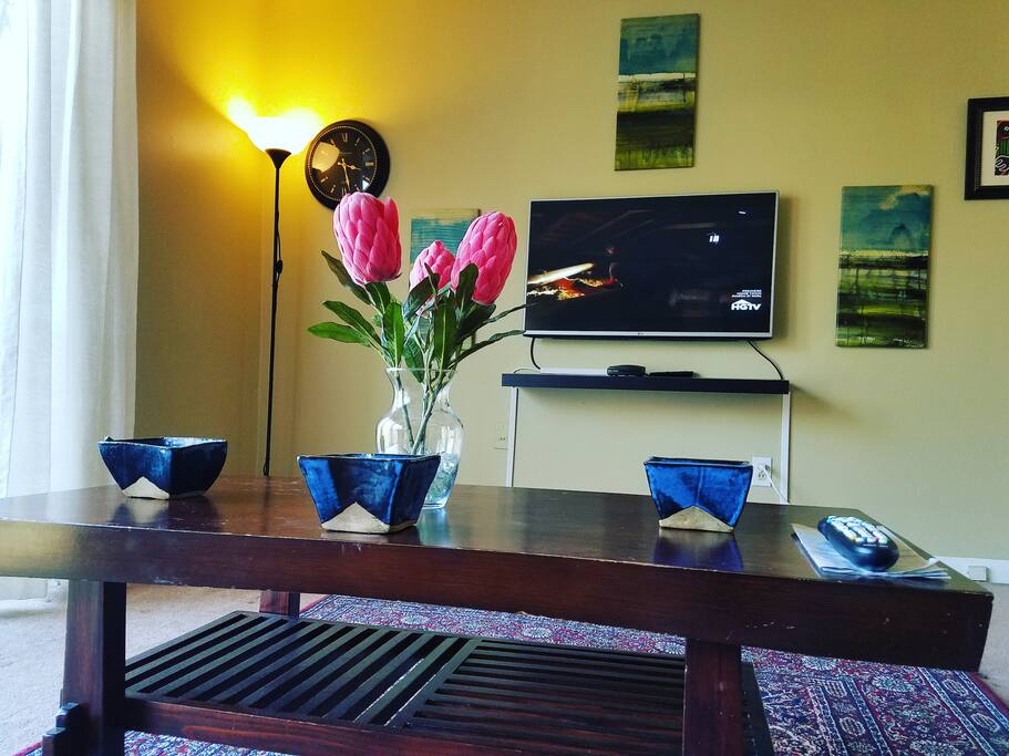 Cozy living room with a flat screen TV.