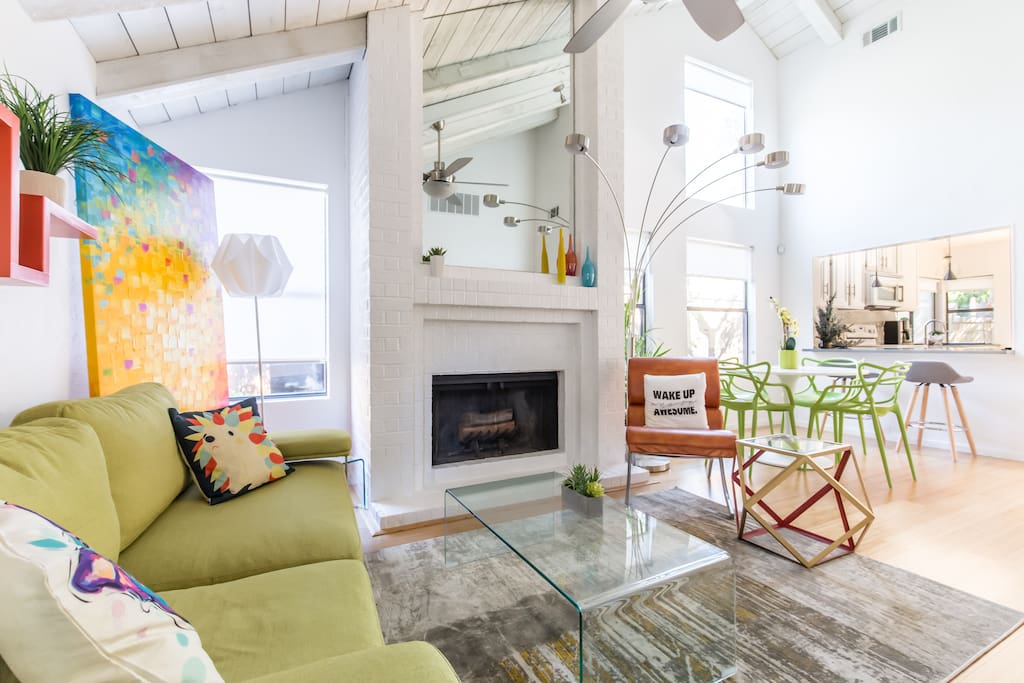 Artsy Living room with high vault ceilings through out the home.