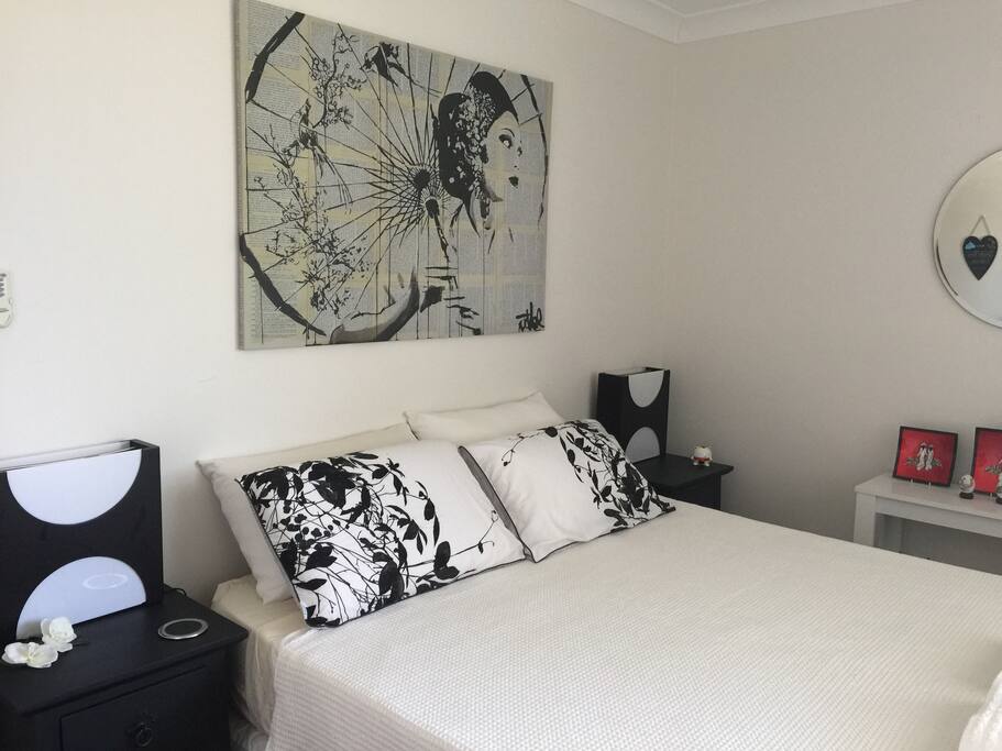 Your room with queen bed.