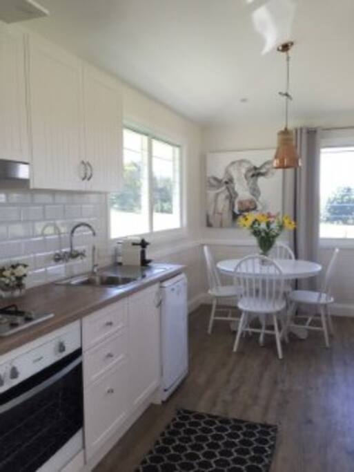 Country Kitchen with all new appliances including oven, gas cooktop, dishwasher & Nespresso machine