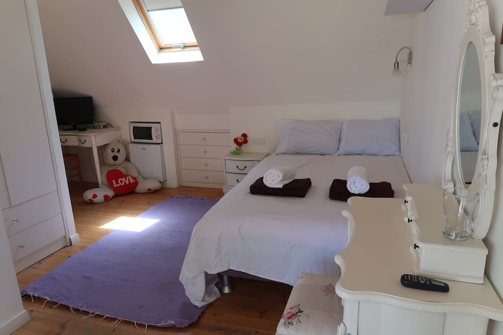 Spacious bed, lots of storage, micro, little fridge, and more