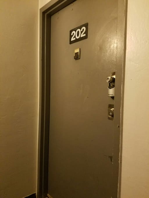 Door with key box. 2nd floor.