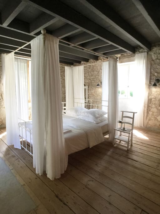 The white bedroom (25m2) is a romantic light filled bedroom.