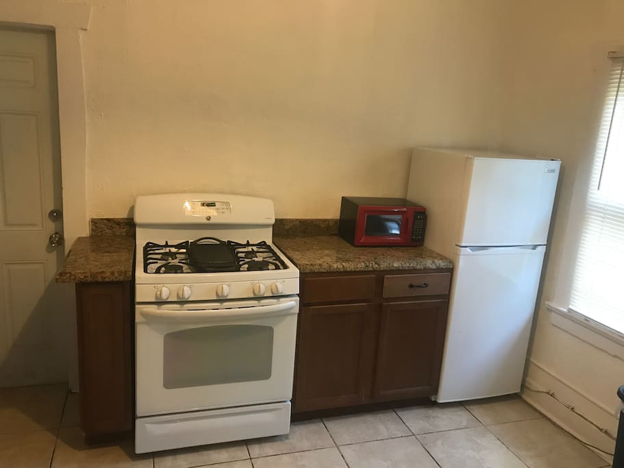 Stove and enough cookware to prepare anything
