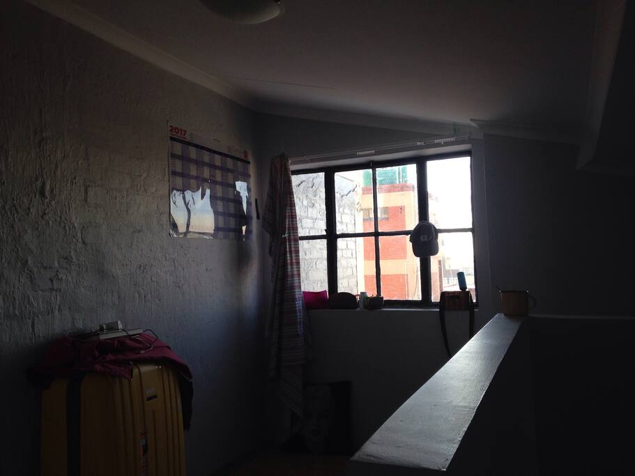 The bedroom area upstairs. There's a beautiful morning light when you wake up.