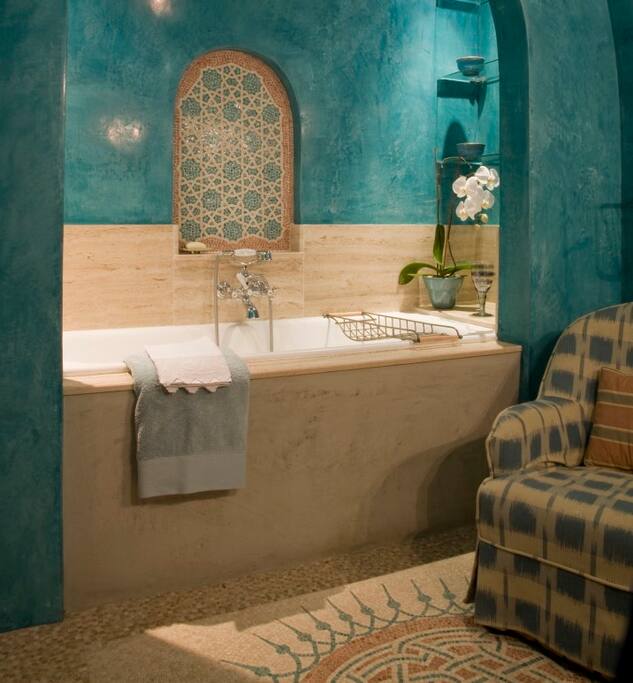 Master en-suite bathroom with Polished plaster walls and hand-made mosaics.