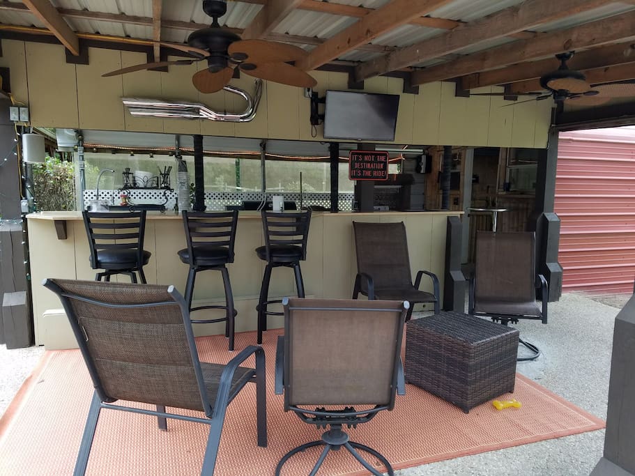 Outdoor Kitchen for BBQ and watching TV.