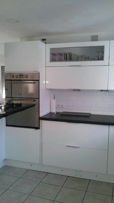 Modern kitchen electric double oven and dishwasher,microwave,gas hob.