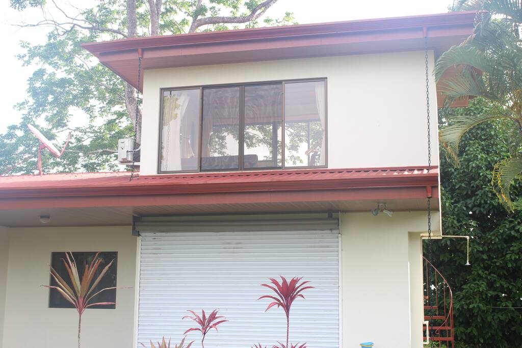 Watch the surf break at Pilon from the Captian's Quarters