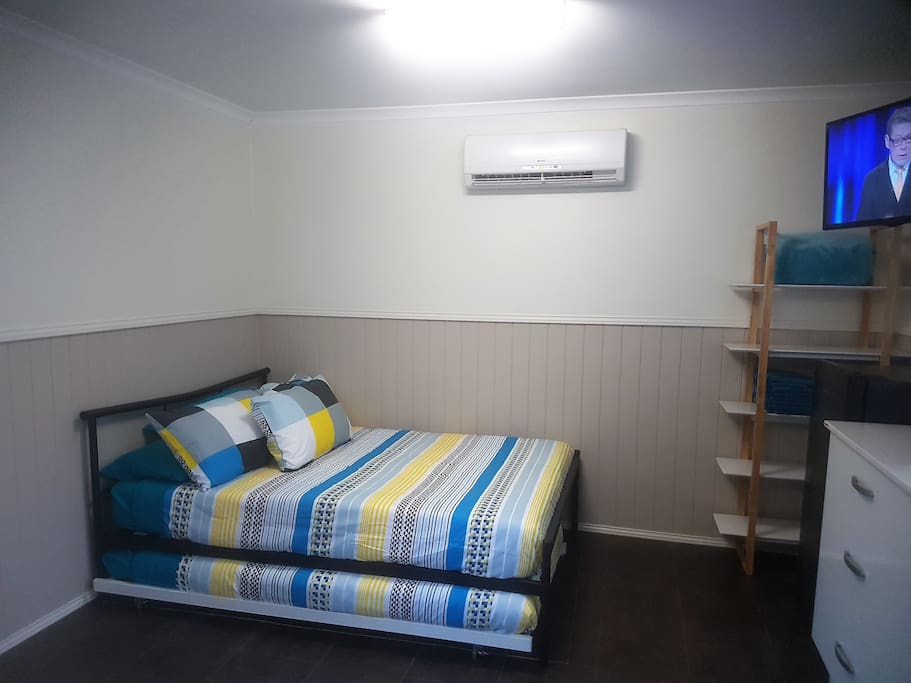 Double Bed with extra trundle underneath.