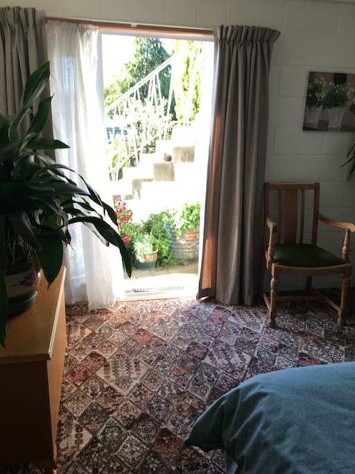 Looking out to private patio with own entrance