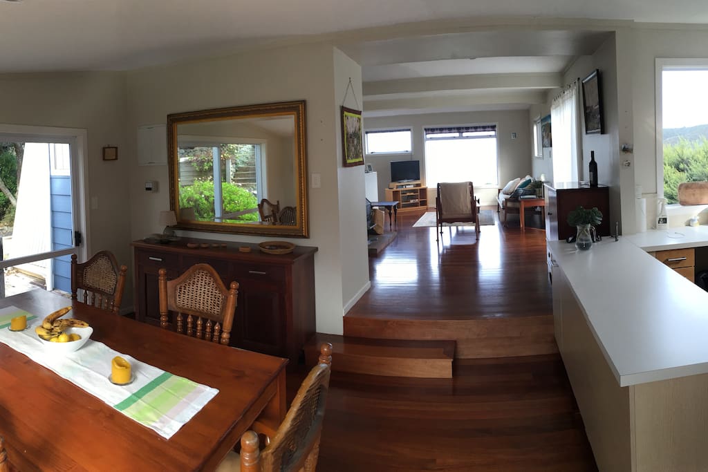 Open plan dining, lounge and kitchen area.