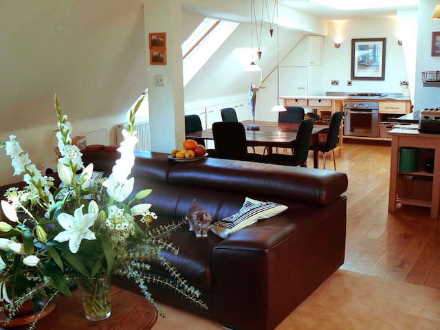 Central, elegant, bright loft with stunning views.