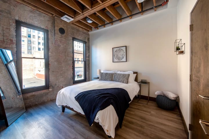 Soft linens and timeless design for a boutique-hotel feel.