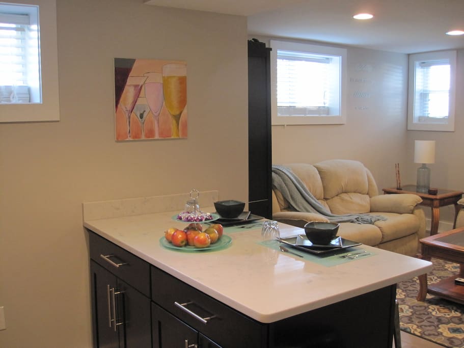 Kitchen opens to spacious, comfortable, well-lit living room