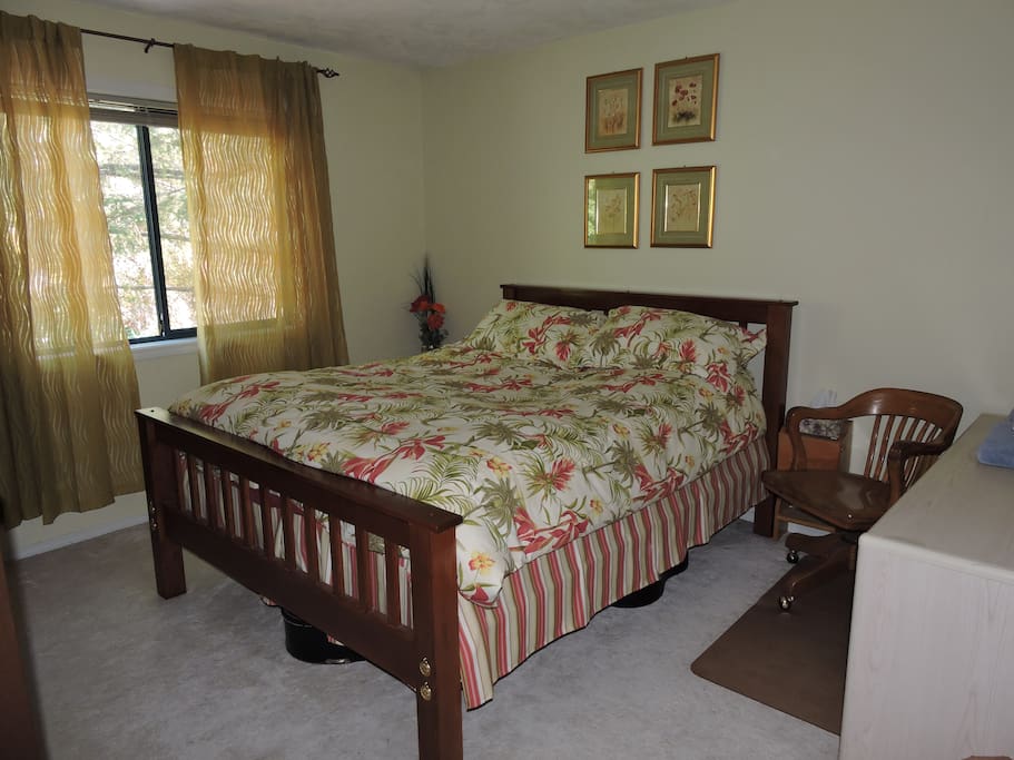 Main bedroom hand made shaker queen bed, desk, chair, forest views