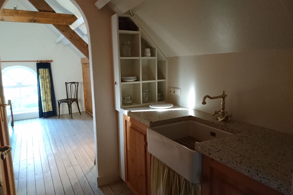 Hallway with sink, cutlery etc.
