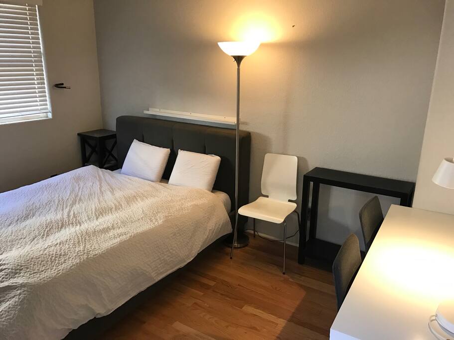 Quiet back bedroom with one queen bed.