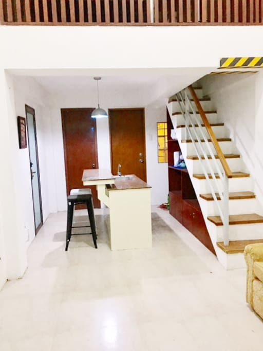 The door on the LEFT is the Bathroom (with shower); door on the RIGHT is the laundry area.