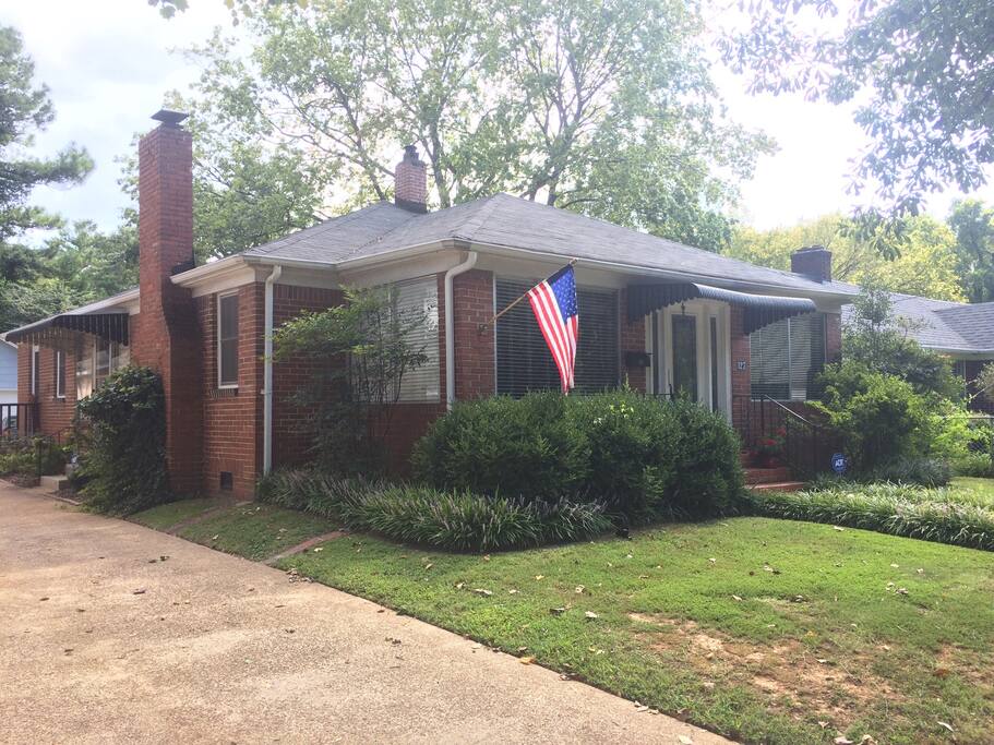 This is the side-view of my house. In the back yard, you'll find a fire pit and swing for relaxing afternoons.