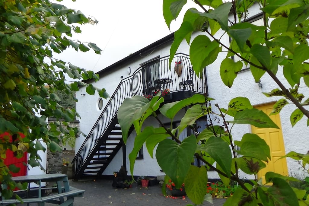 Courtyard and stairs up to Apartment Dara.