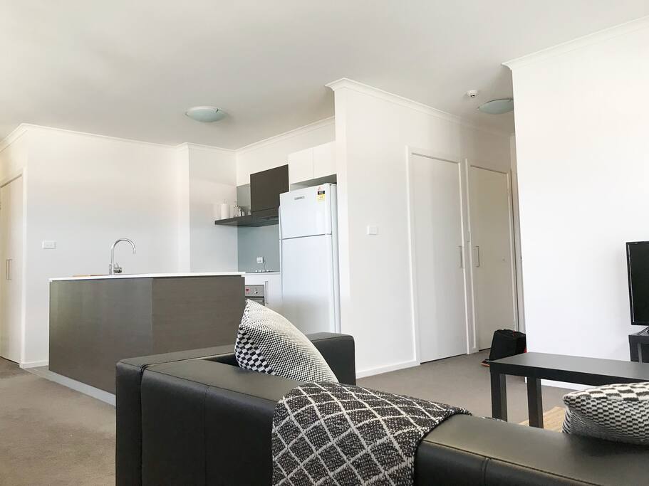 Living Area to Kitchen and Hallway