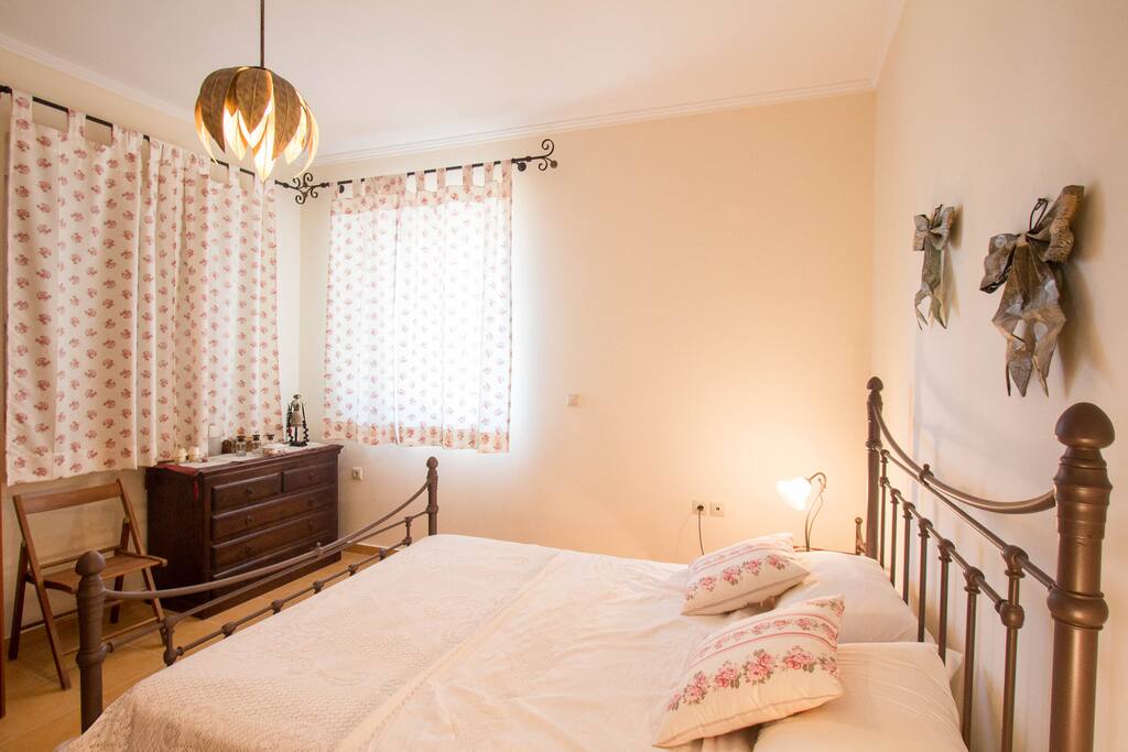 Cosy master bedroom with a queen sized bed for two people