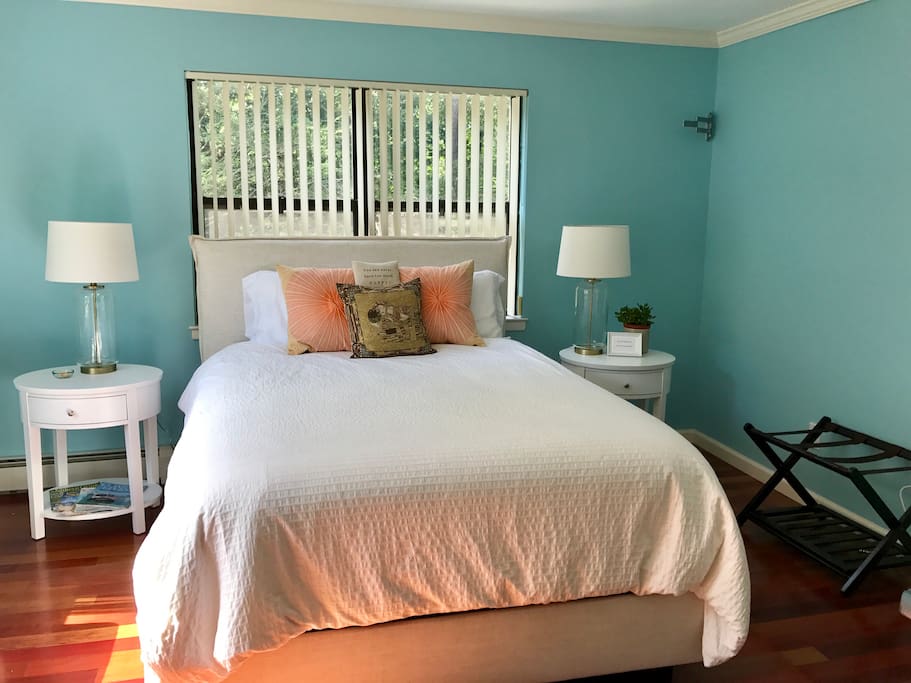 We refer to this room as the Carolina room. It has a brand new queen sized bed.
