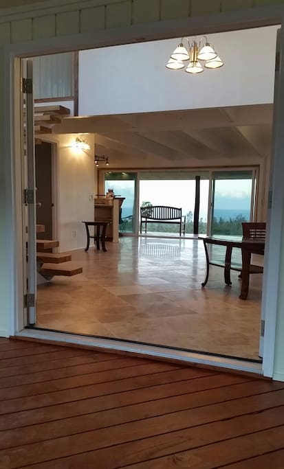 Large living room open to the ocean view.